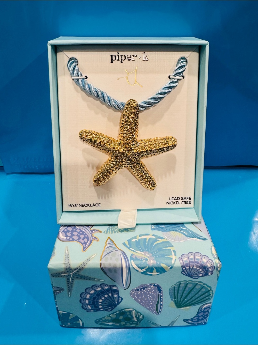 NWT Piper•k Gold Glitter Starfish Necklace with Light Blue Cord - Picture 2 of 12